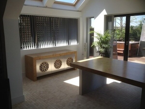 Bespoke oak sideboard with floral cut-out doors