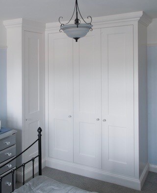 Fitted shaker wardrobes in bedroom