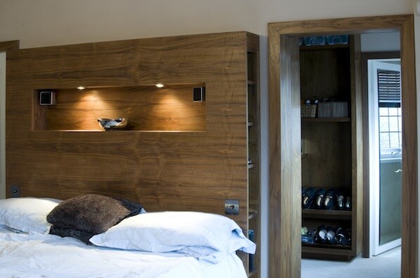 Walnut bedroom headboard with lit display niche